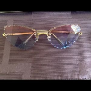 Cat eye pink/purple tinted sunglasses